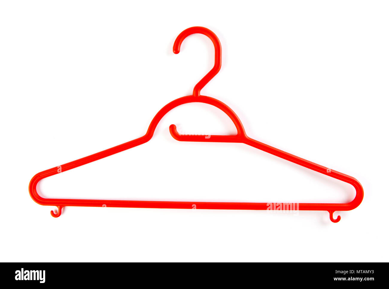 Green plastic hanger for clothes on a white background Stock Photo