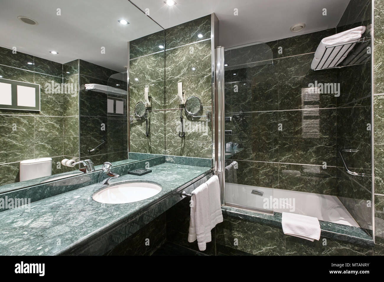 Luxury bathroom in green marble. Decoraton hotel home interior ...
