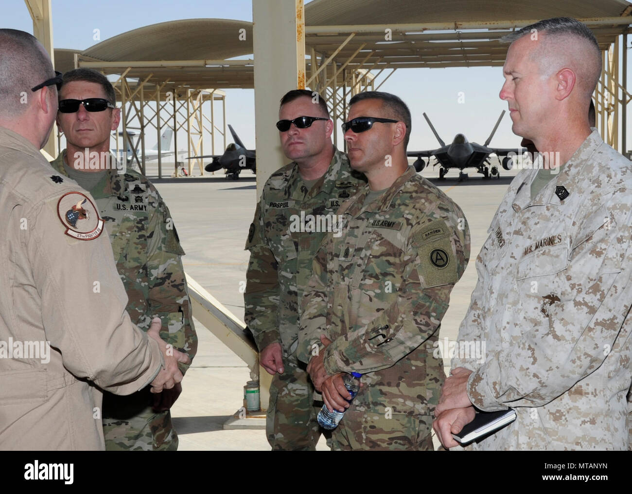 Lt. Col. Shell, 27th Expeditionary Fighter Squadron commander, briefs U ...