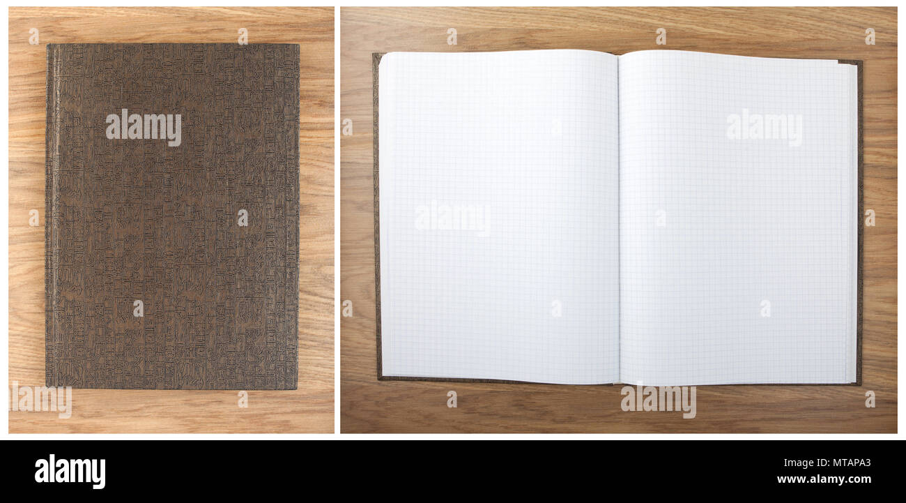 Blank squared notebook sheets on a table. Notebook with hieroglyphics on the cover Stock Photo