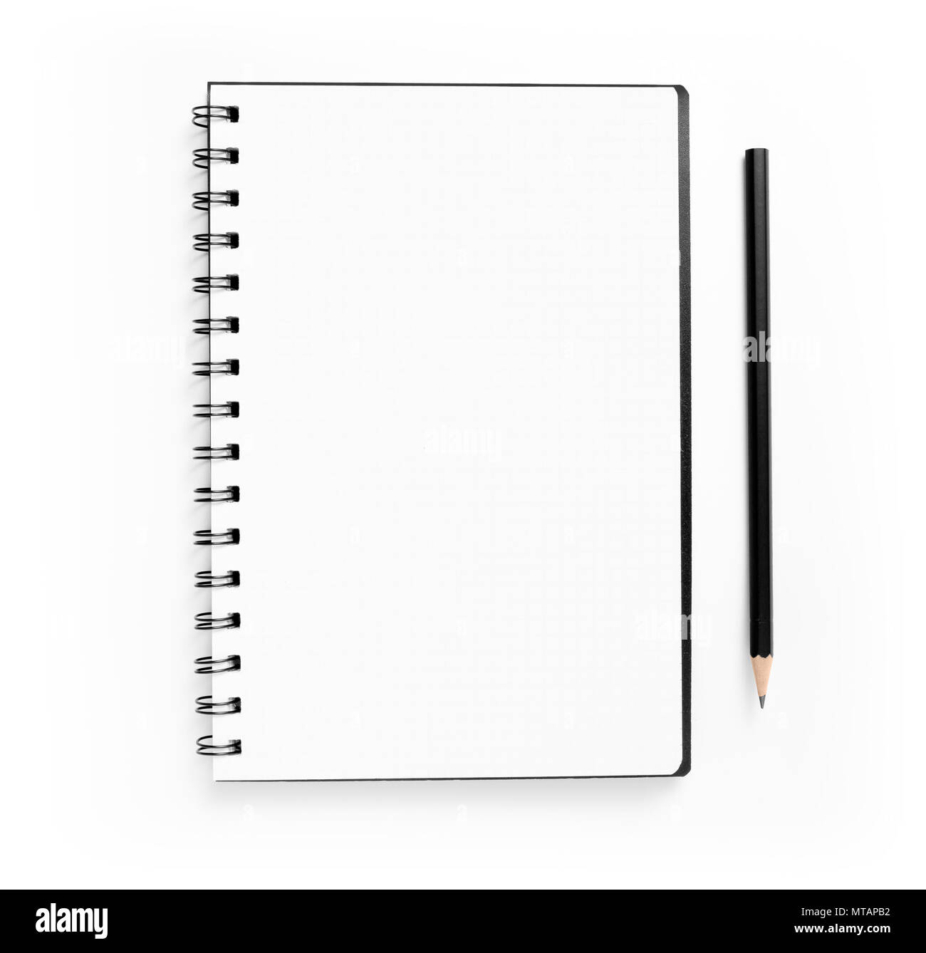 Blank spiral notepad and pencil on white background Stock Photo