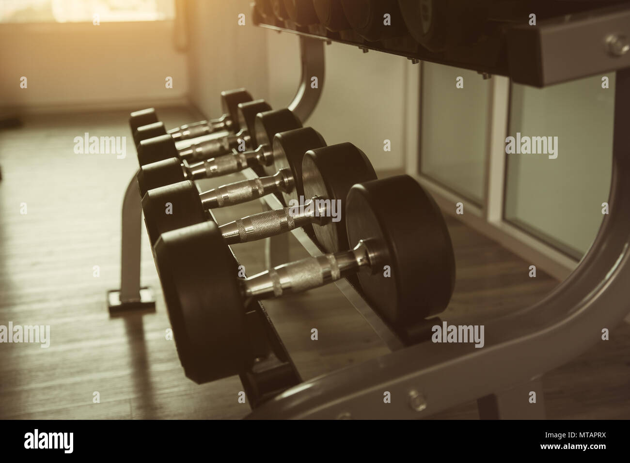 row of drumbell in fitness vintage color tone Stock Photo