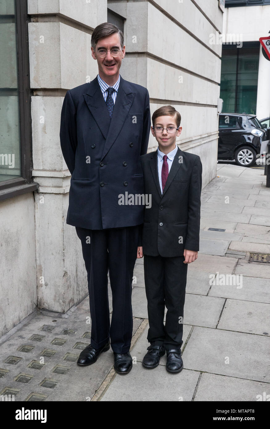 Jacob Rees-Mogg, MP for North Somerset at the BBC Studios to appear on 'The Andrew Marr Show' with his eldest son Peter Theodore Alphege Stock Photo