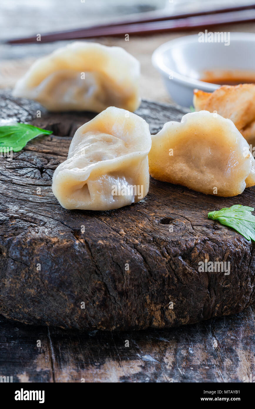 Chinese pork dumplings - dim sum - with sweet chili dipping sauce Stock ...