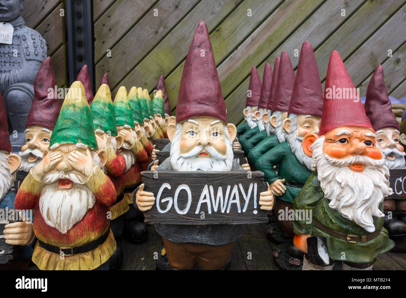 Welcome and Go Away garden gnomes mirror the UK's divided public opinion relating to Brexit Stock Photo