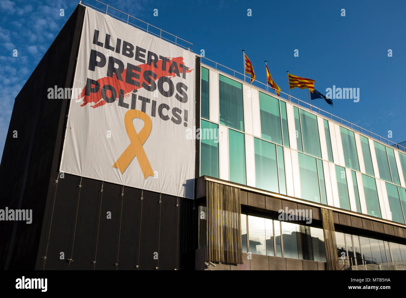 Banner supporting Catalan prisoners on the town hall of Sant Cugat del Valles, near Barcelona, Catalonia. Stock Photo