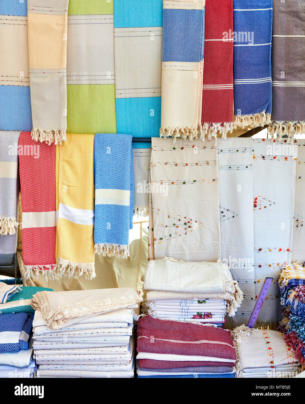 Pastel colorful loincloth and tablecloth hanging in an authentic Turkish bazaar Stock Photo