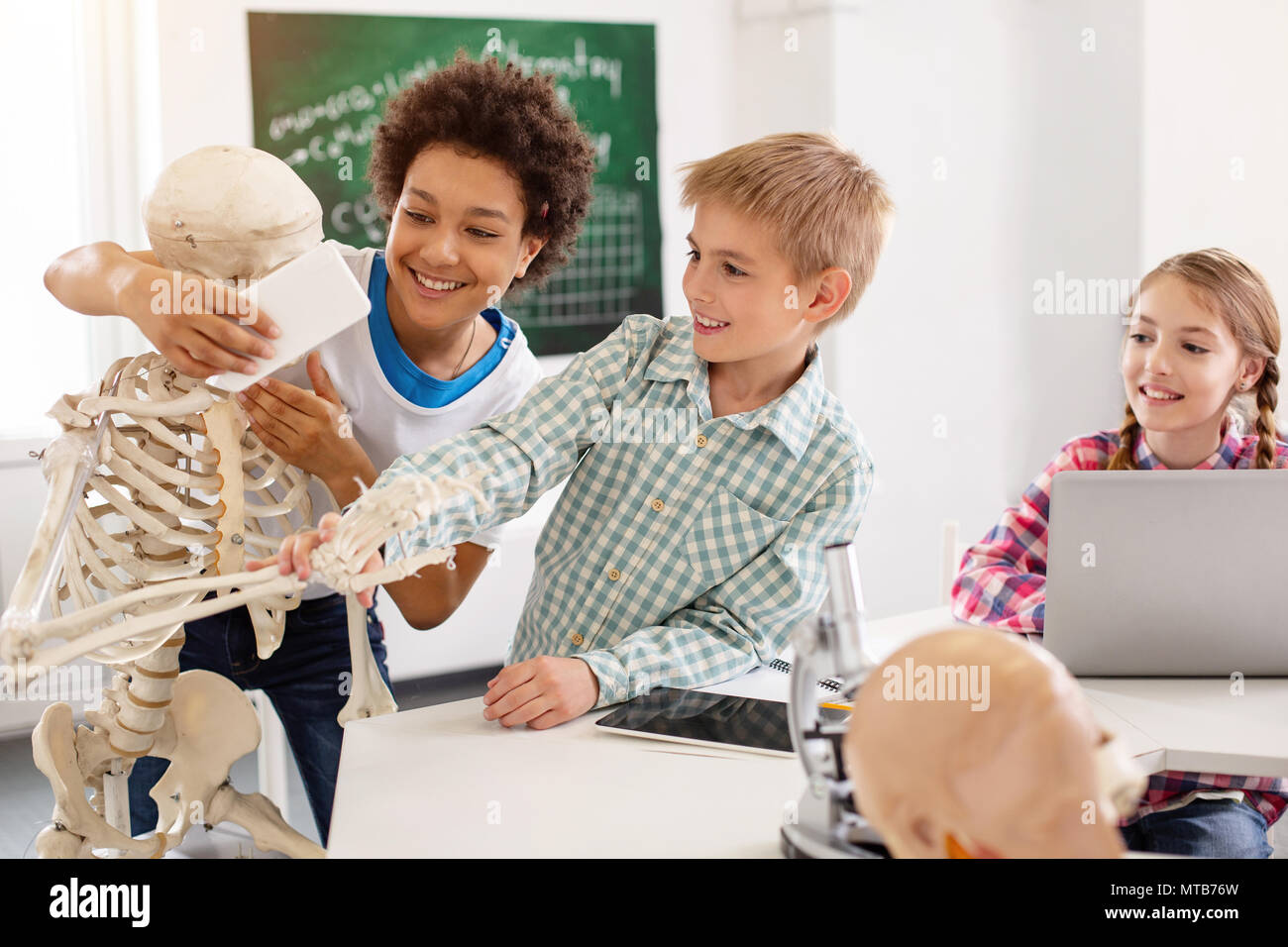 Boys playing close teen hi-res stock photography and images - Alamy