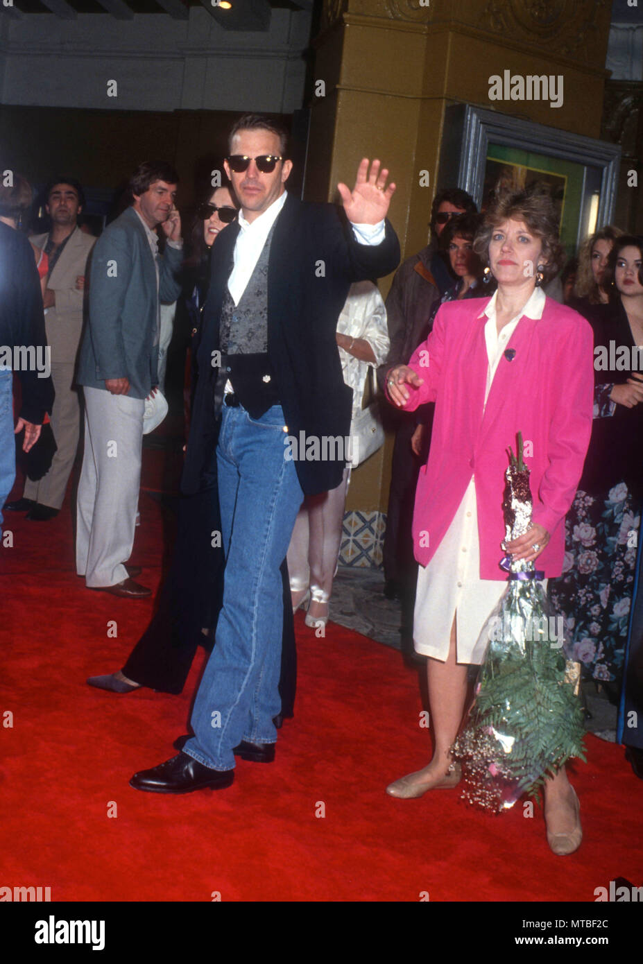 LOS ANGELES, CA - JUNE 10: (L-R) Cindy Costner and actor Kevin Costner attend the 'Robin Hood: Prince of Thieves' Westwood Premiere on June 10, 1991 at the Mann Village and Bruin Theatres in Los Angeles, California. Photo by Barry King/Alamy Stock Photo Stock Photo