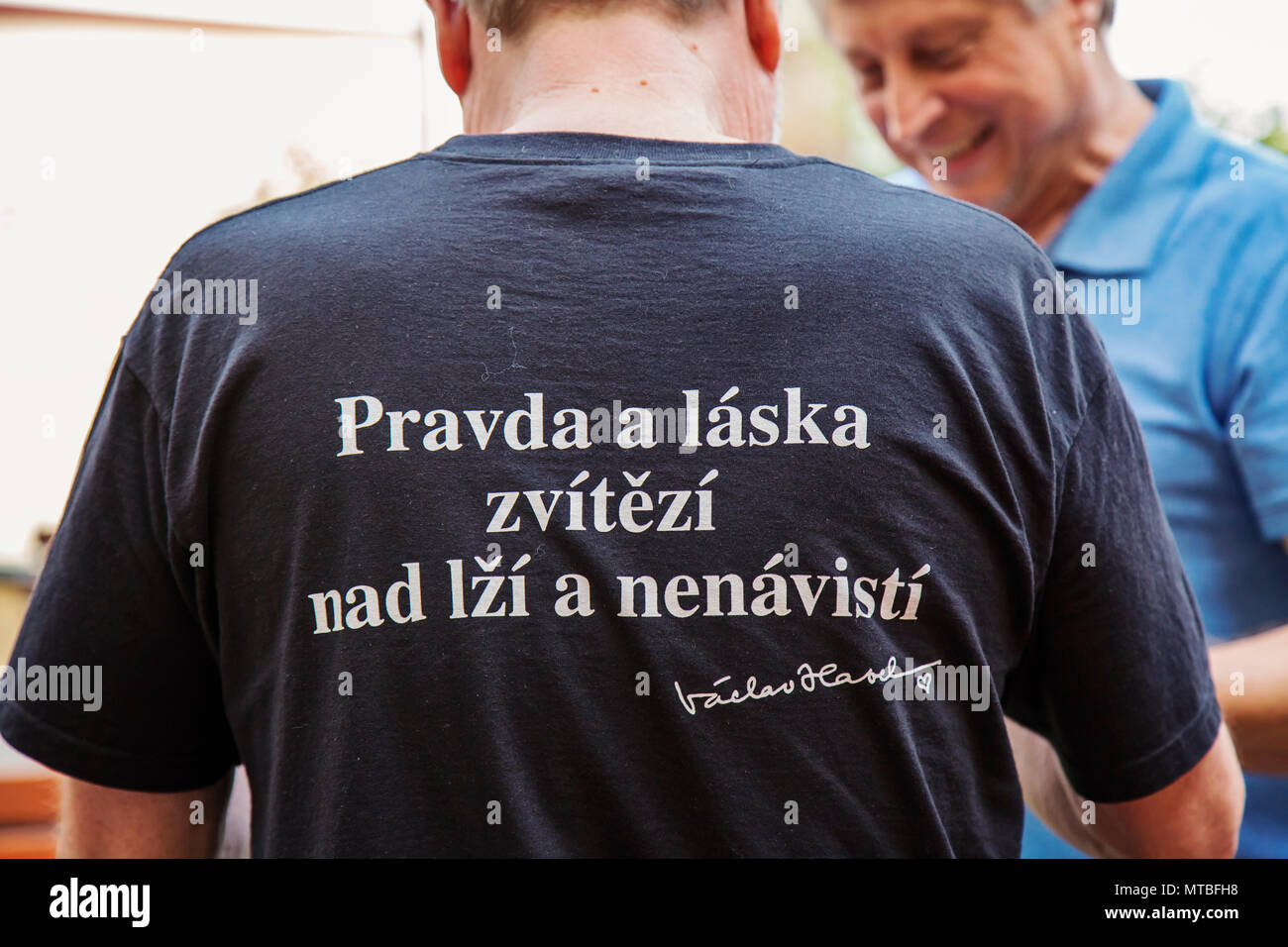 Prague, Czech May 26,2018: Man wearing T-shirt with Vaclav Havel most popular motto: “Truth and love will triumph over lies and hatred” Stock Photo - Alamy