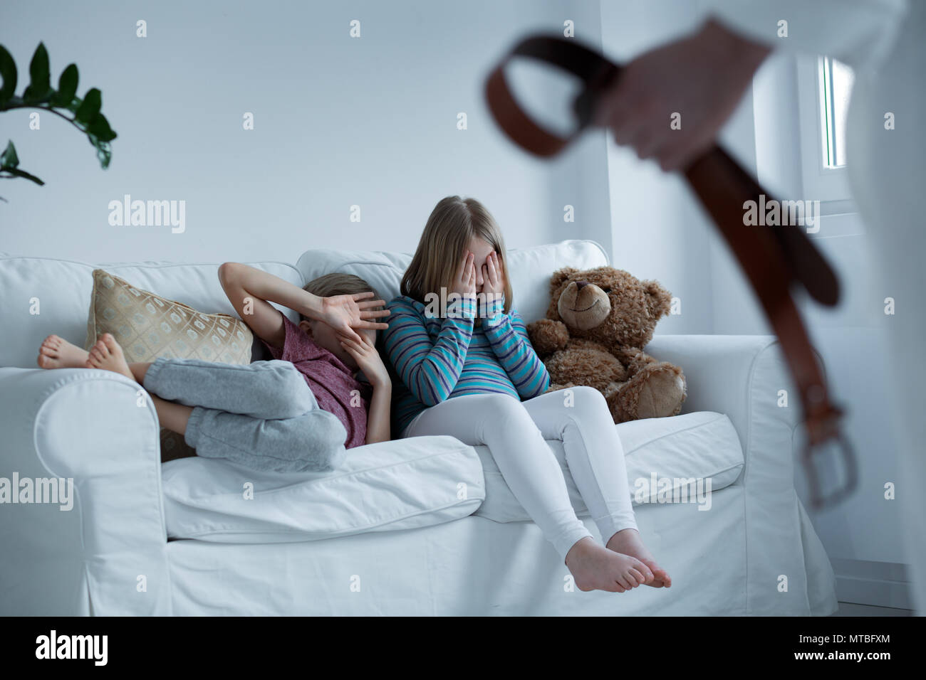 Children being unsafe in their own home Stock Photo