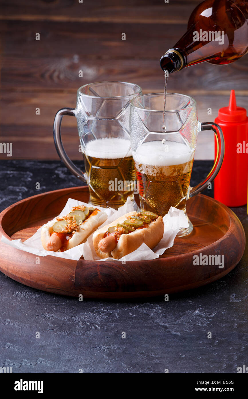 Image of two mugs of beer and hot dogs Stock Photo