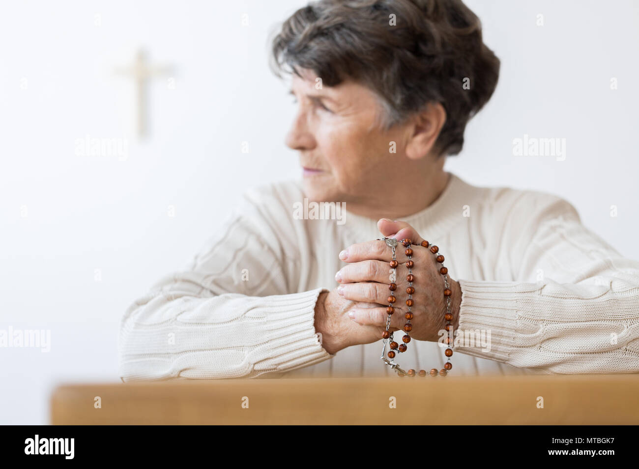 An old woman with a rosary hi-res stock photography and images - Alamy