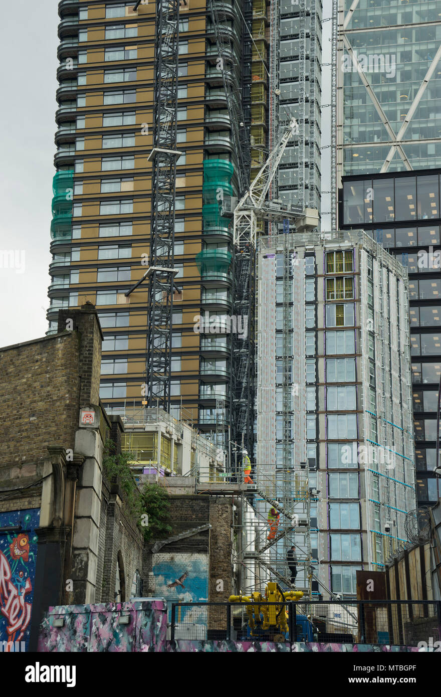 Image showcasing Construction site of new luxury skyscrapers in Shoreditch by the City ...