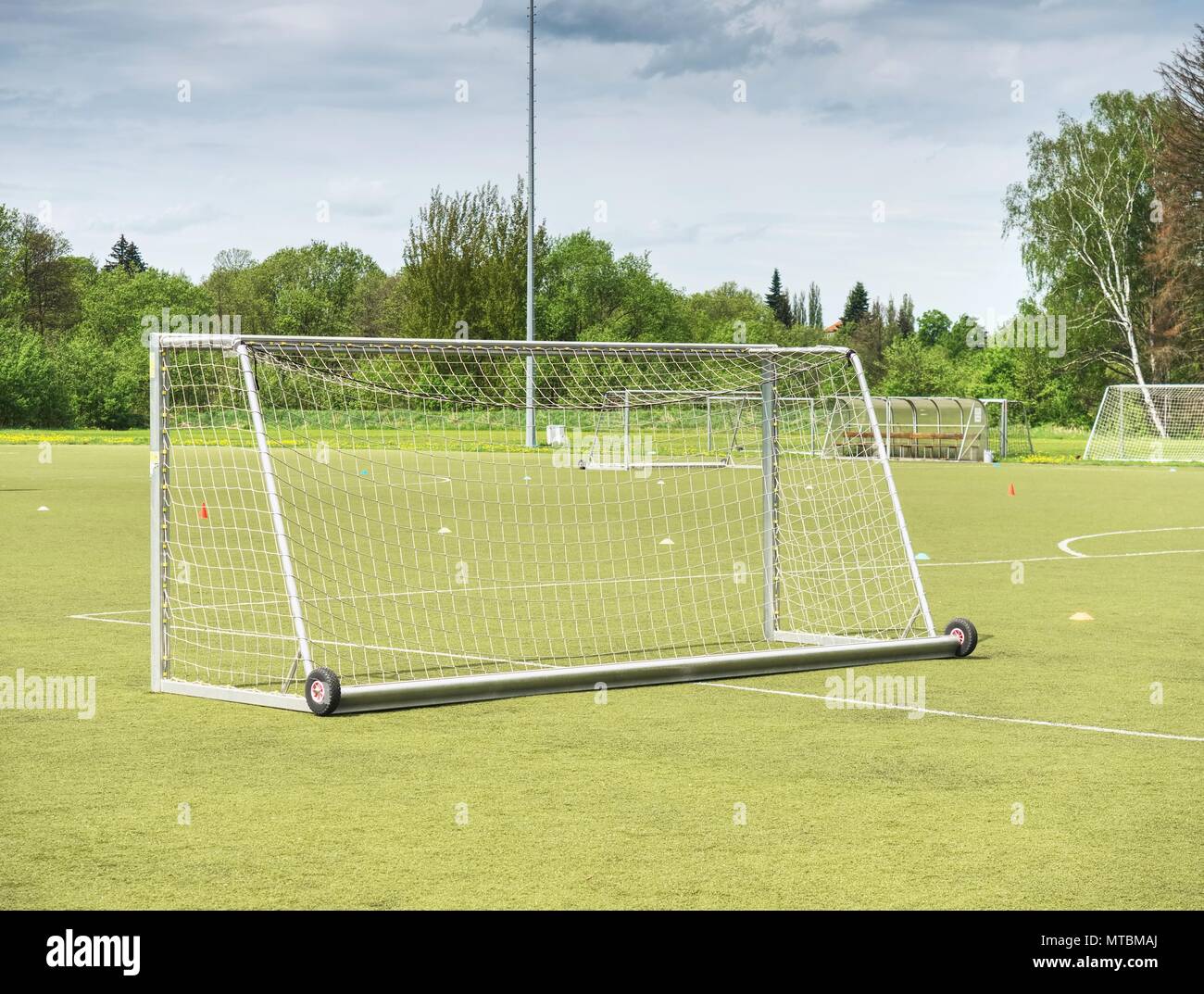 On football soccer field. Behind goal of soccer field. Soccer football