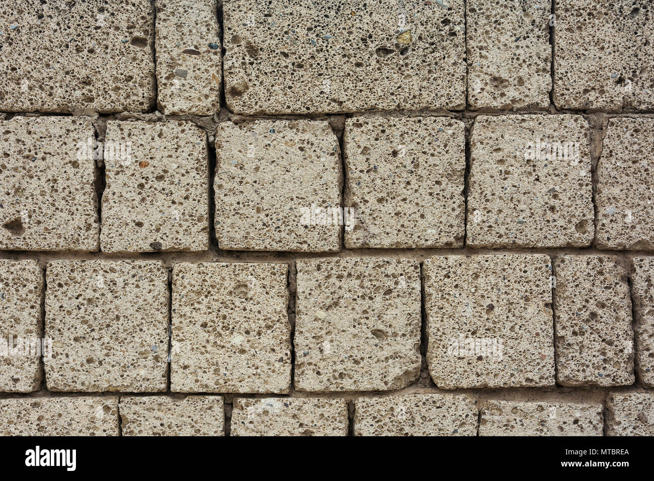 Wall masonry from shells of square and rectangular shape Stock Photo