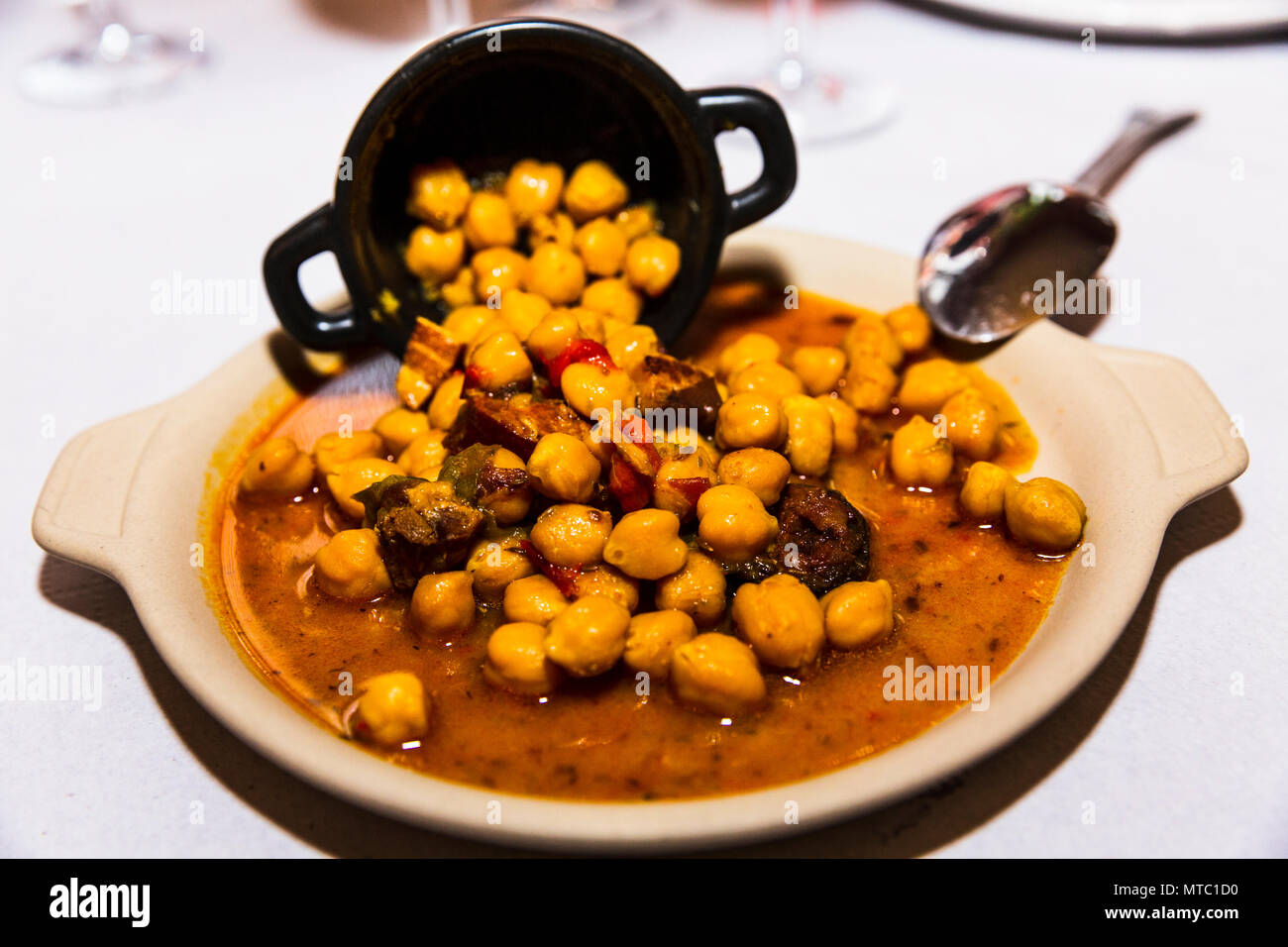 Typical chickpea and chorizo dish served in restaurant El Tejar, Vilaflor, Canary Islands, Spain, Stock Photo