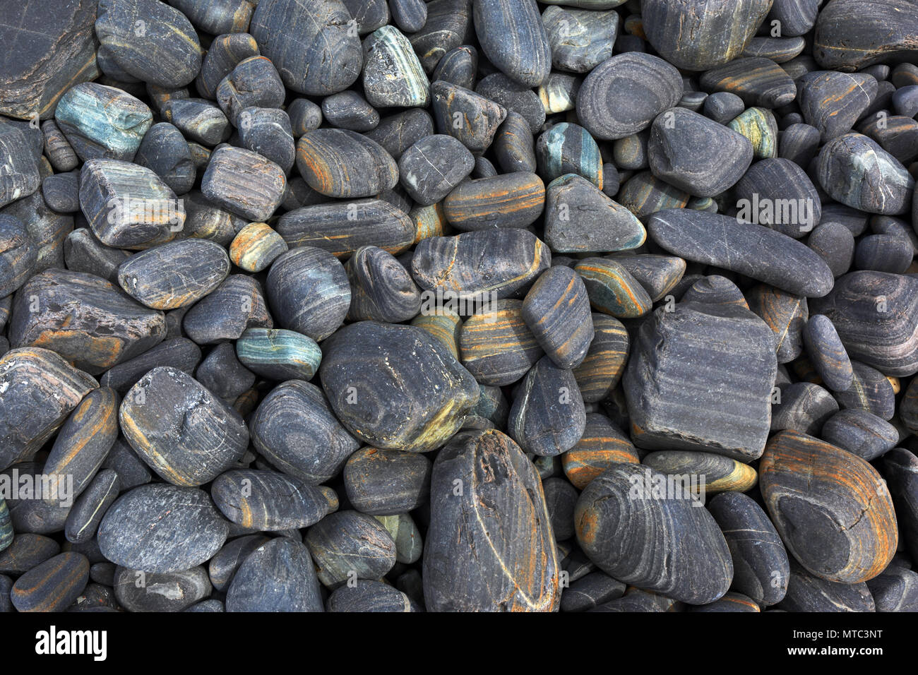 Gray striped pebble background  Stock Photo