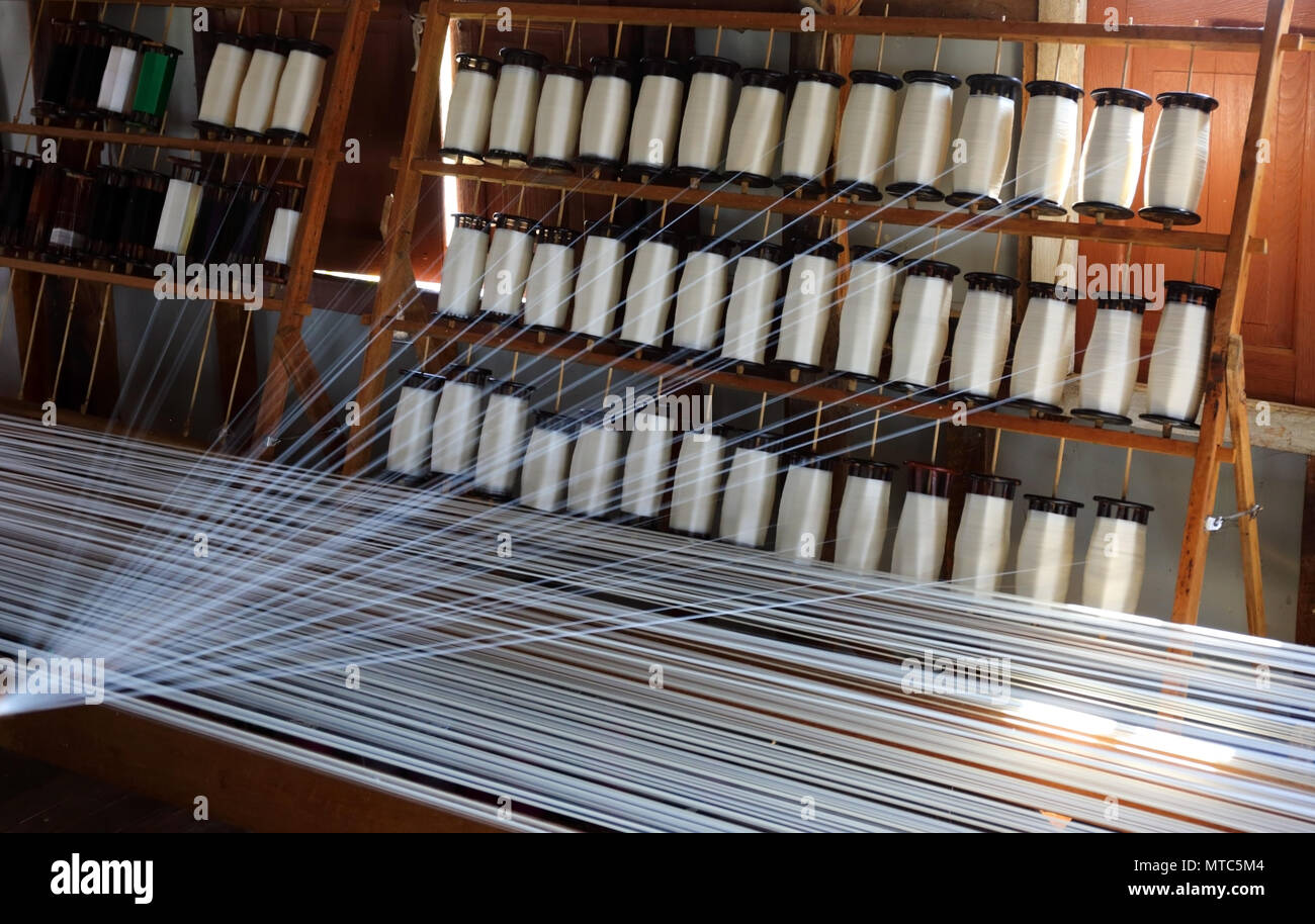 Silk thread on weaving tool Stock Photo Alamy