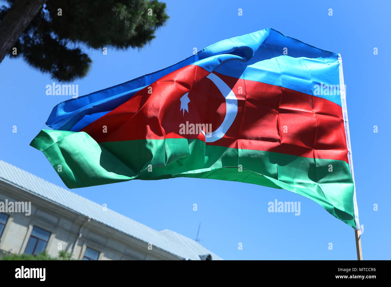 Azerbaijan flag in Baku, Azerbaijan. National sign background. Red ...