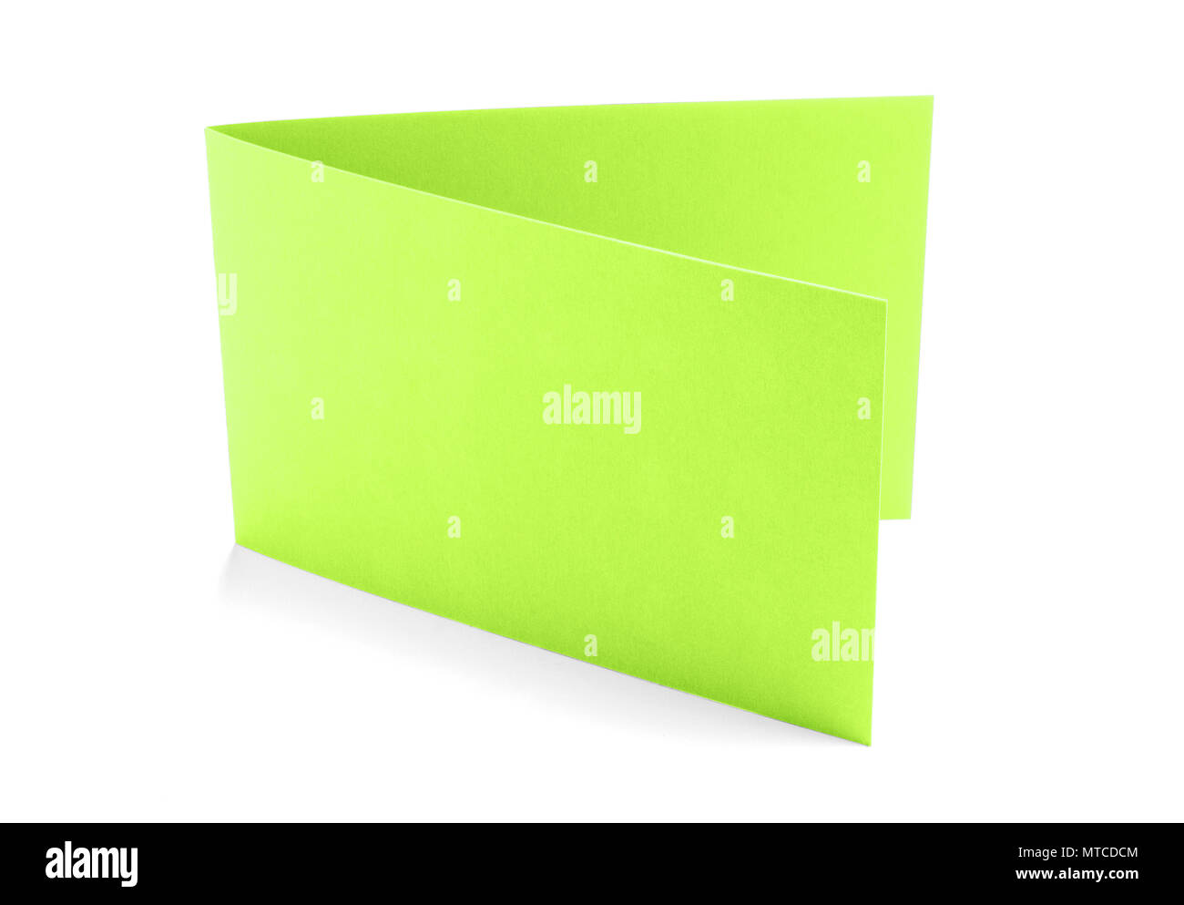 Two fold green card on white background Stock Photo