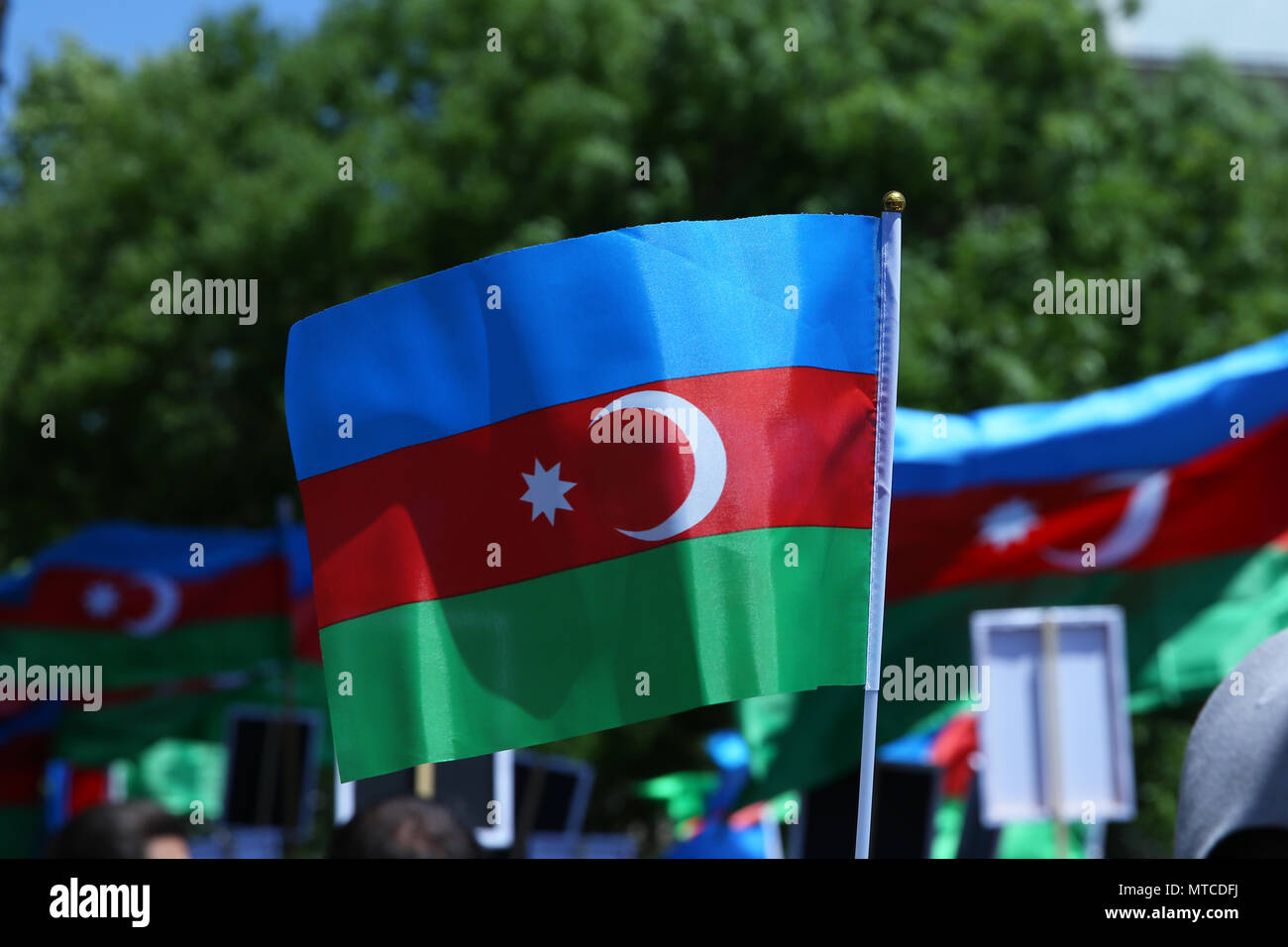 Azerbaijan flag in Baku, Azerbaijan. National sign background. Red Green Blue flag. Azerbaijan national flag with Crescent moon. Azerbaijan tradition  Stock Photo