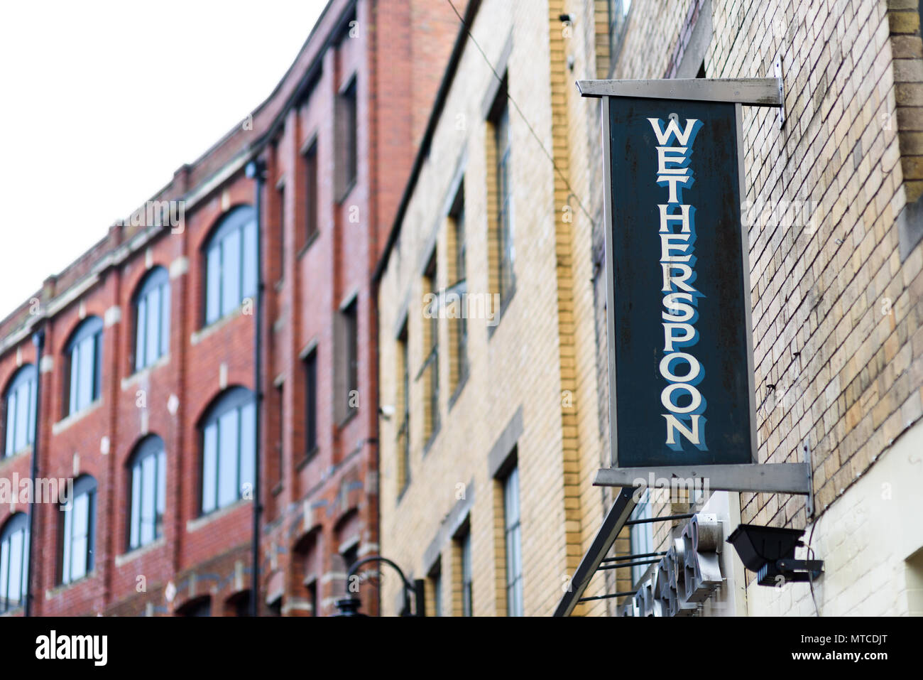 Cardiff, Wales, UK, May 27, 2018: Wetherspoon sign on the side of building in Womanby Street Stock Photo