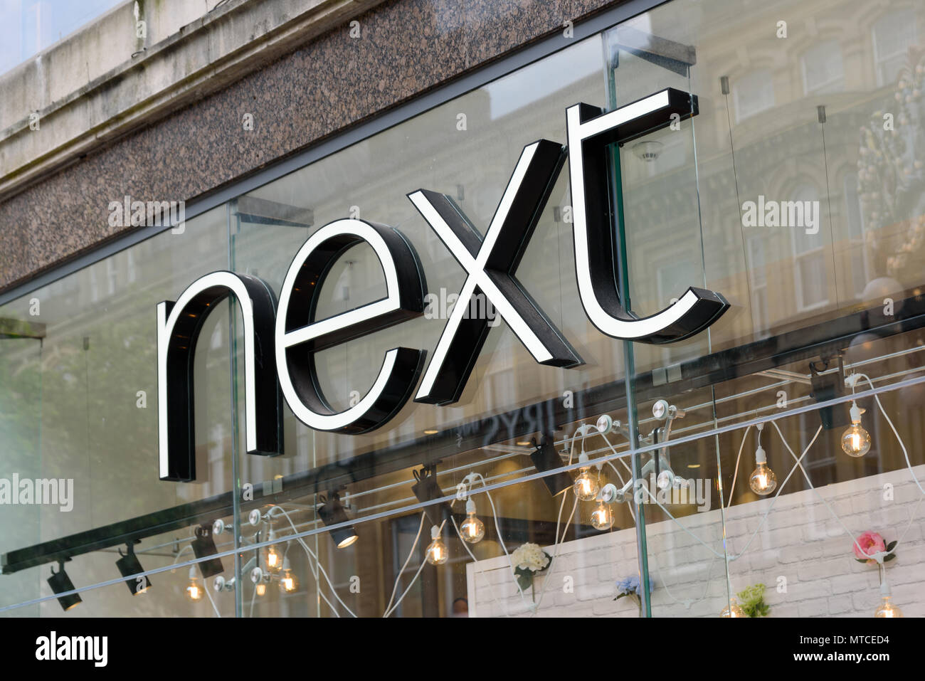 Cardiff, Wales, UK, May 27, 2018 High street retailer Next signage on