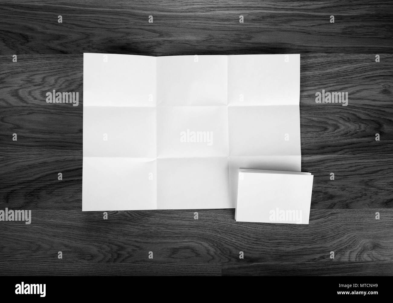 White sheet of paper folded in nine top shooting Stock Photo Alamy