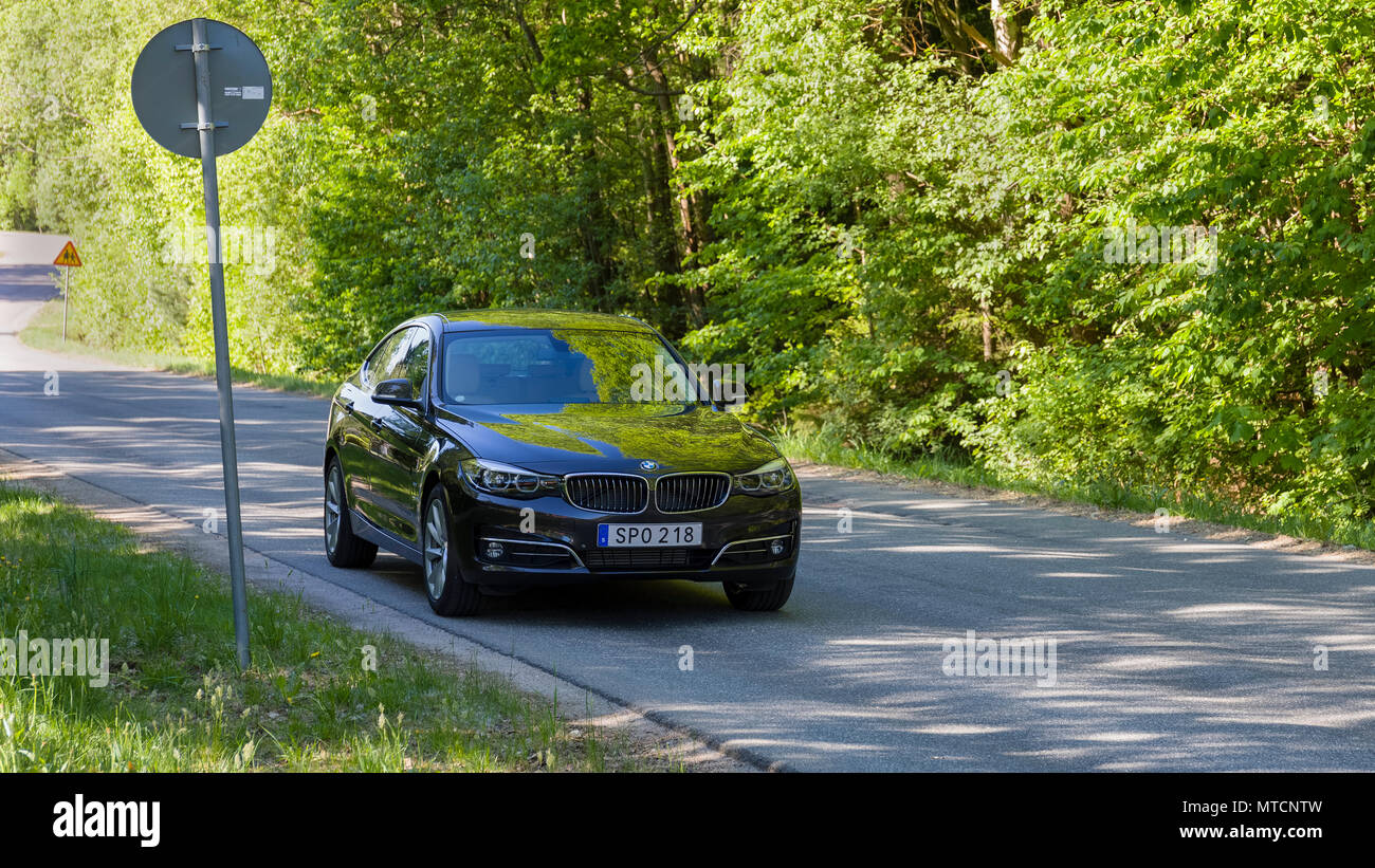FLODA, SWEDEN - MAY 19 2018: Shiny new BMW 320D small luxury sedan car parked on street Stock Photo