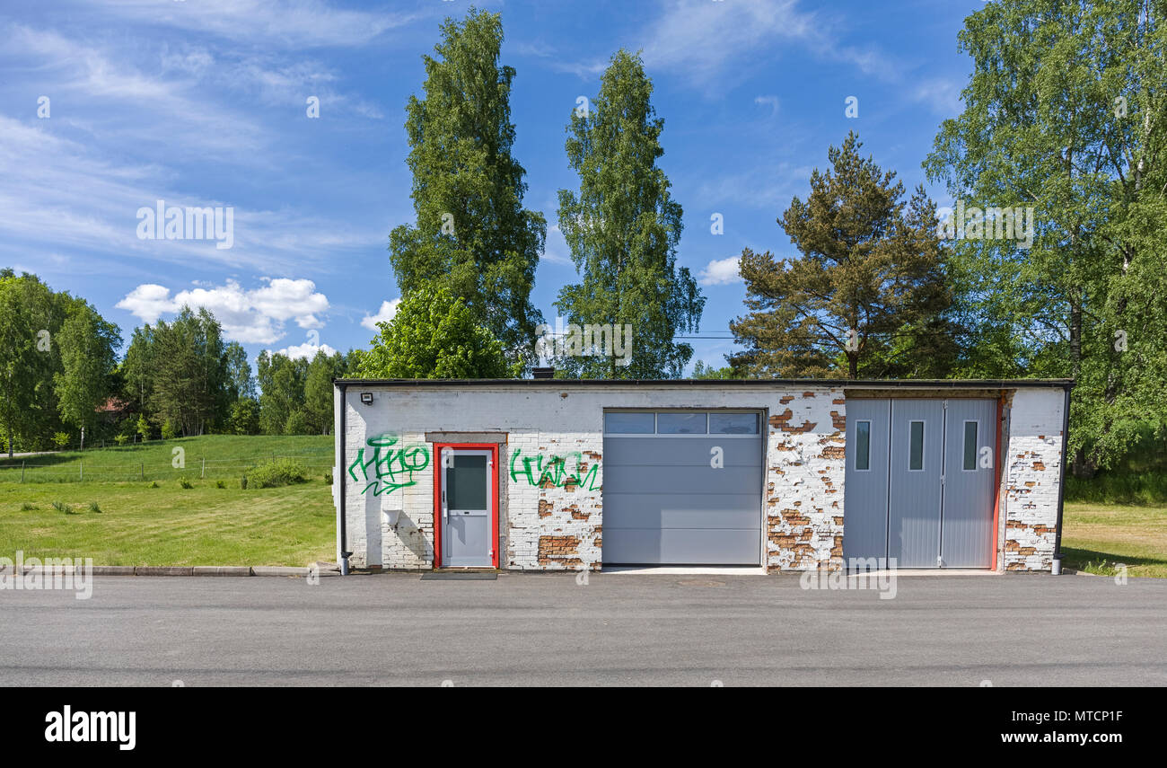 Abandoned petrol gas station covered in graffiti Stock Photo