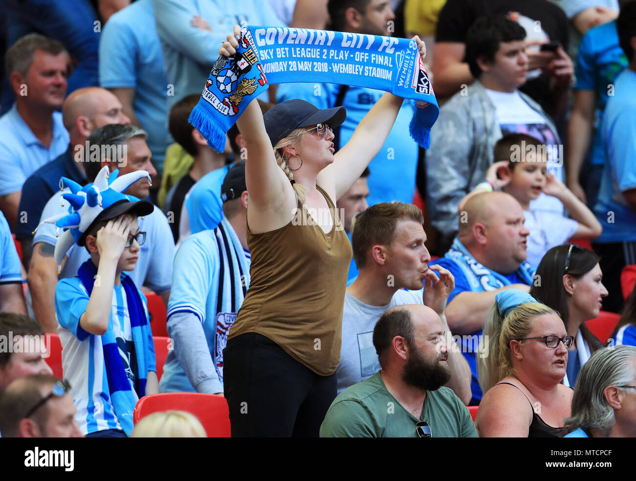 Coventry City fans celebrate in the stands Stock Photo Alamy