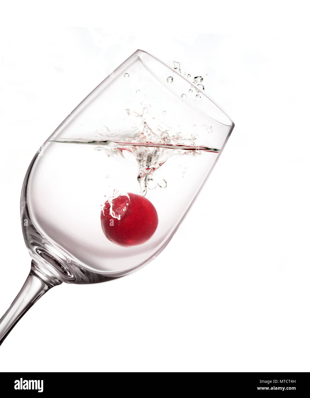 Wine glass with sherry on white background. Stock Photo