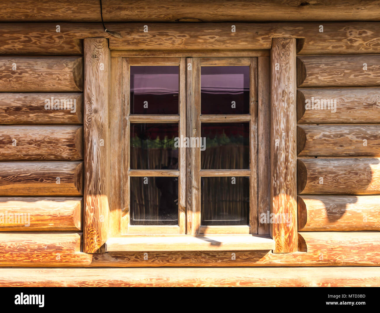 Wooden Window Wall Of Round Wooden Logs Traditional Construction