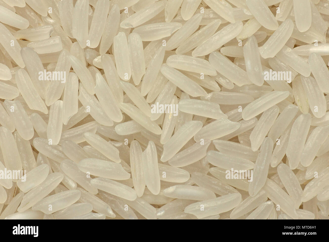 Long grain white rice background, closeup Stock Photo