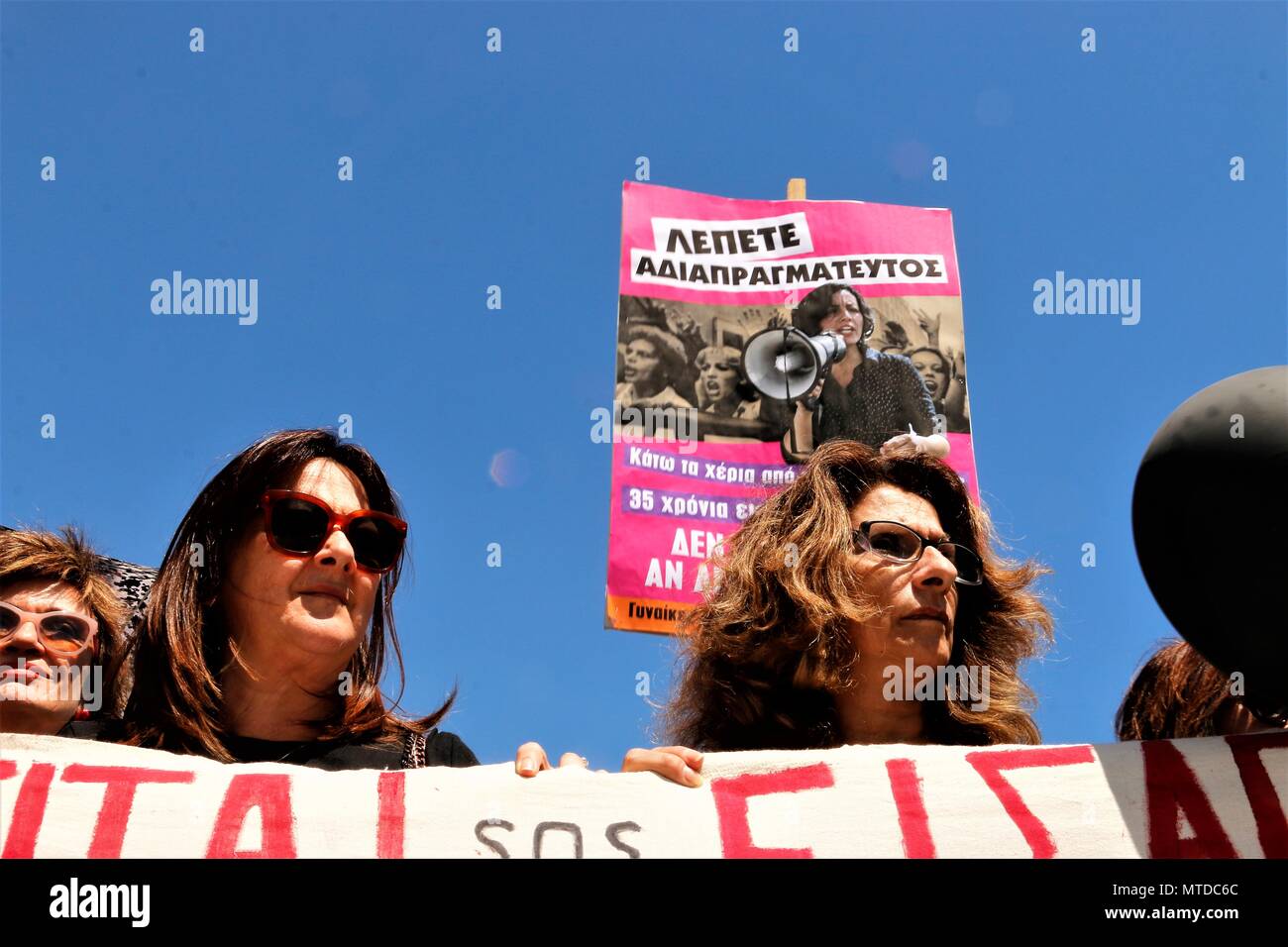 Women Seen Holding A Large Banner During The Demonstration Greek