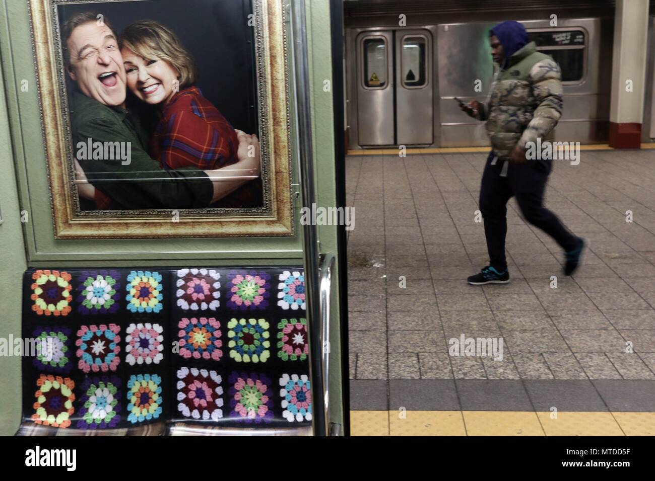 New York City, New York, USA. 6th Mar, 2018. Ahead of a reboot of the Nineteen Eighties television comedy series 'Roseanne' staring Roseanne Barr and John Goodman, the ABC Television Network has transformed a New York City subway car with the interior designed to look like the set of ''Roseanne, with giant portraits of the main characters, the TV familys patchwork quilt lining the seats, a fireplace and family photos. The ''Roseanne'' revival premieres March 27 on the ABC Network. Credit: 2018 G. Ronald Lopez/ZUMA Wire/Alamy Live News Stock Photo