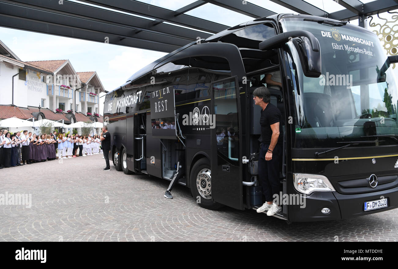 23 May 2018, Italy, Eppan: Coach Joachim Loew gets off the bus of the  German national team after its arrival at hotel 'Weinegg'. The German  national football team will prepare for the