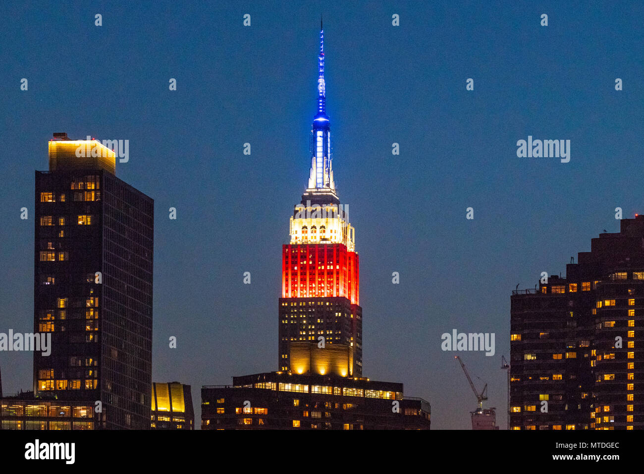 New York, USA, 29 May 2018.  The Empire State Building is lit in red, white and blue tonight in honor of the 2018 French Open and the Tennis Channel.    Photo by Enrique Shore Credit: Enrique Shore/Alamy Live News Stock Photo