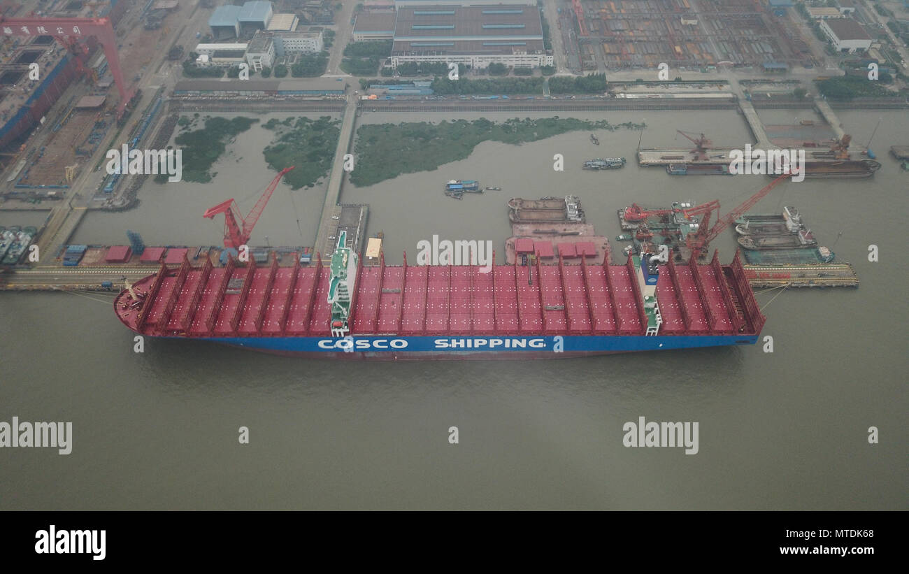 Shanghai. 30th May, 2018. Photo taken on May 30, 2018 shows the 20,000-TEU ultra-large container ship, named the 'Cosco Shipping Virgo' and built by Shanghai Waigaoqiao Shipbuilding Company in Shanghai, east China. The 399.8-meter-long and 58.6-meter-wide container ship has a maximum capacity of 200,000 tonnes. It was delivered to China COSCO Shipping Corporation Ltd. on Tuesday. Credit: Ding Ting/Xinhua/Alamy Live News Stock Photo