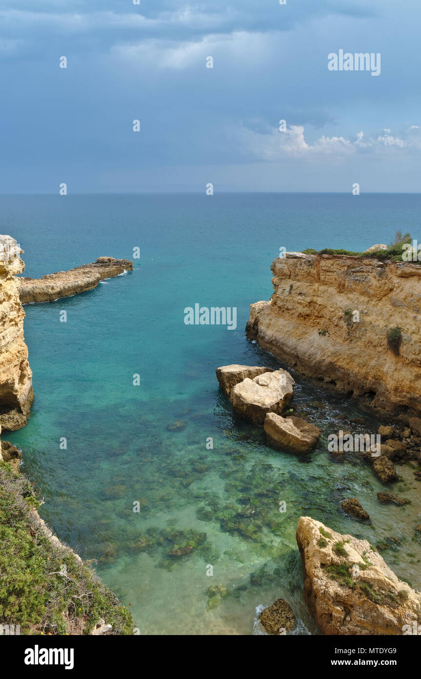 Cliffs views of the coast of Lagoa, touristic attraction for caves and boat tours. Algarve, Portugal Stock Photo