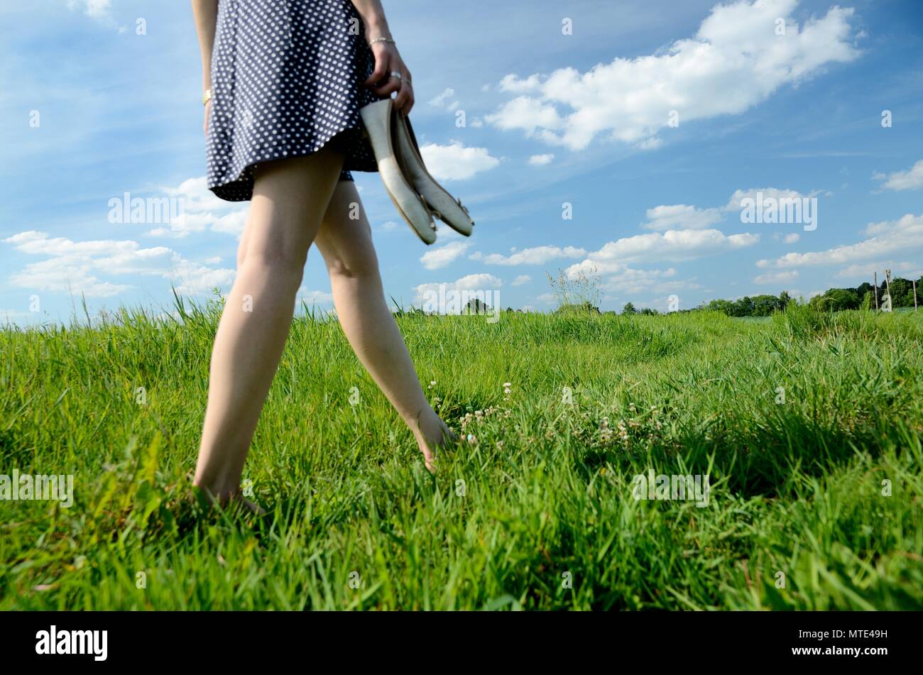 Barefoot woman resting feet on hi-res stock photography and images - Alamy
