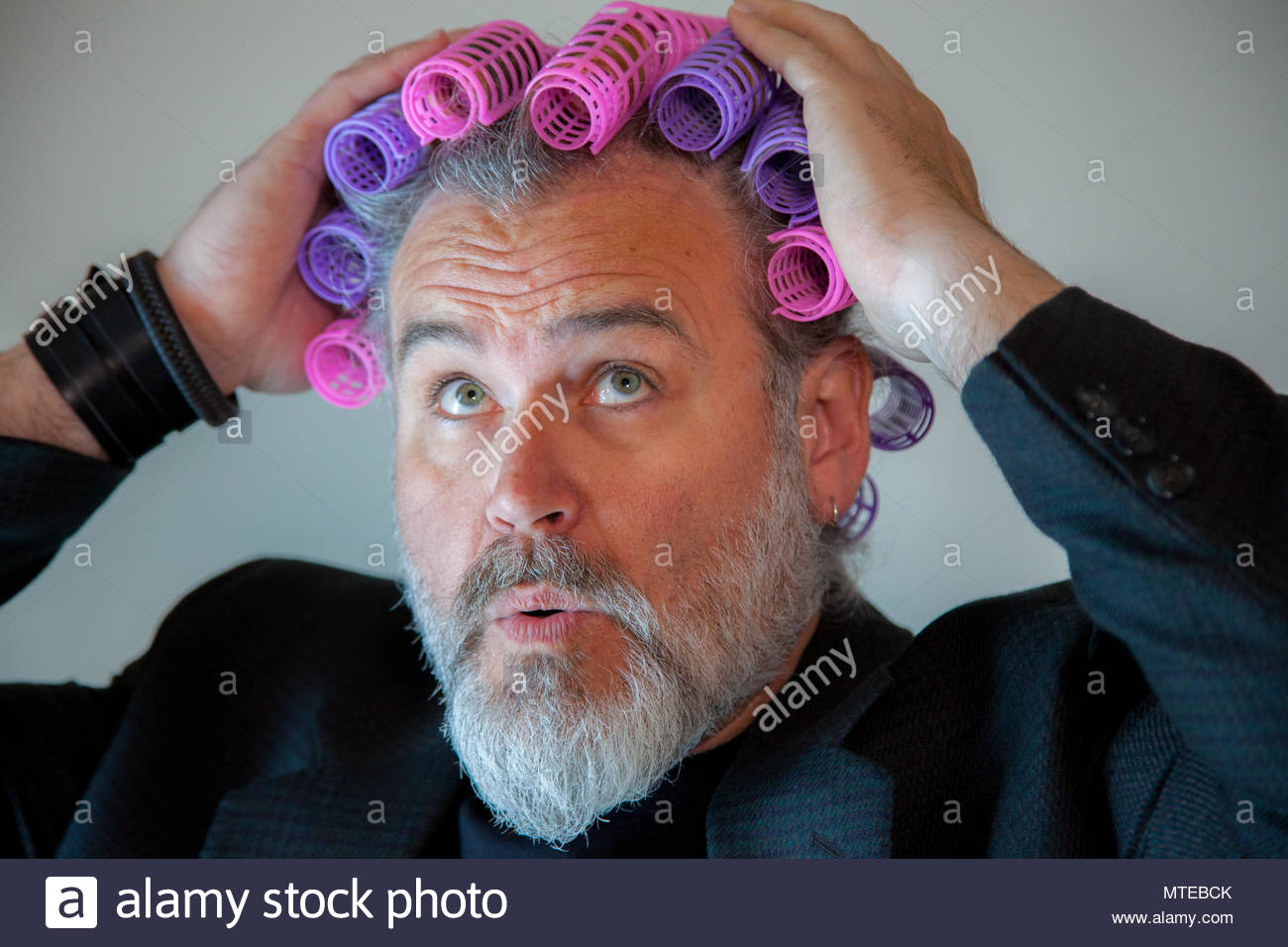 Man With A Head Full Of Hair Curlers Stock Photo 187171731 Alamy