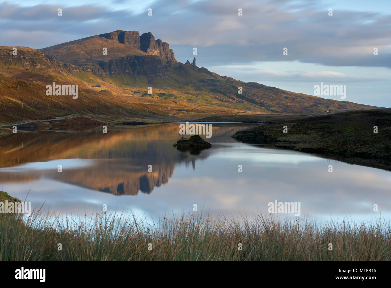 Rock formation of the Old Man of Storr with Loch Leathan, Skye, Scotland, Great Britain Stock Photo