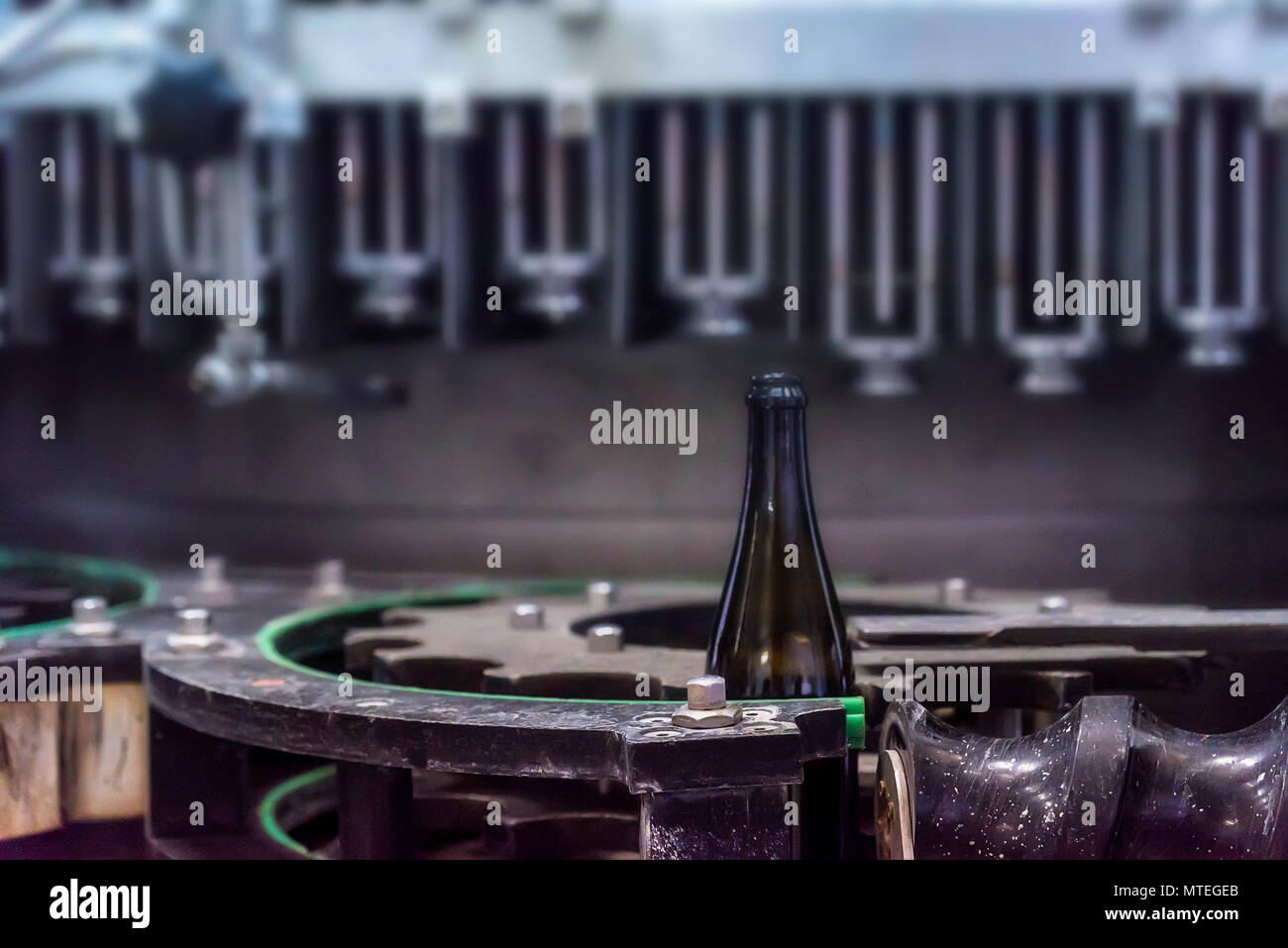 Wine bottle on corking conveyor at winery Stock Photo Alamy