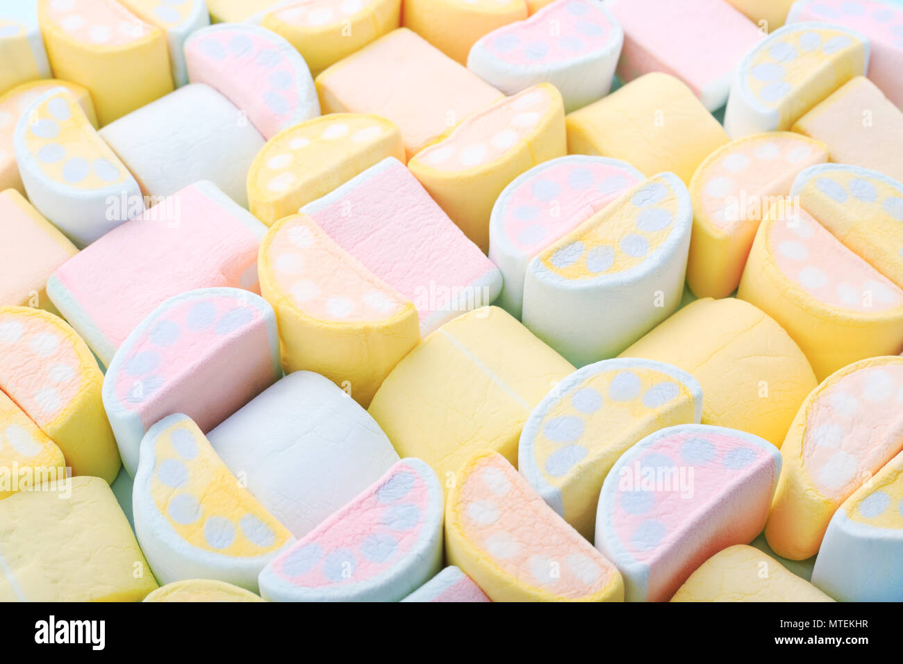 Detailed closeup of colorful white, pink and yellow marshmallows Stock  Photo - Alamy