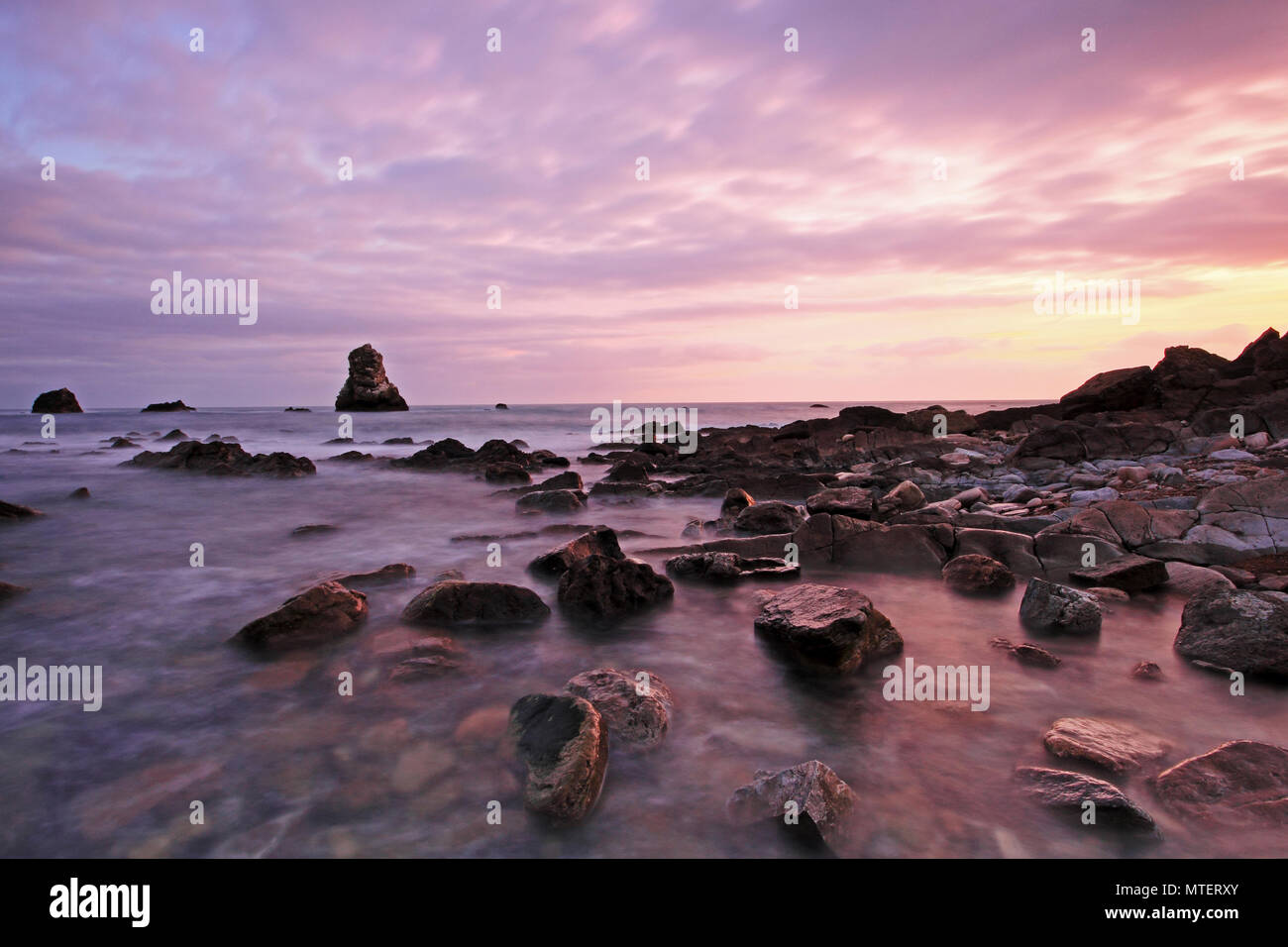 Rocks at Mupe Bay at sunset, Dorset Stock Photo