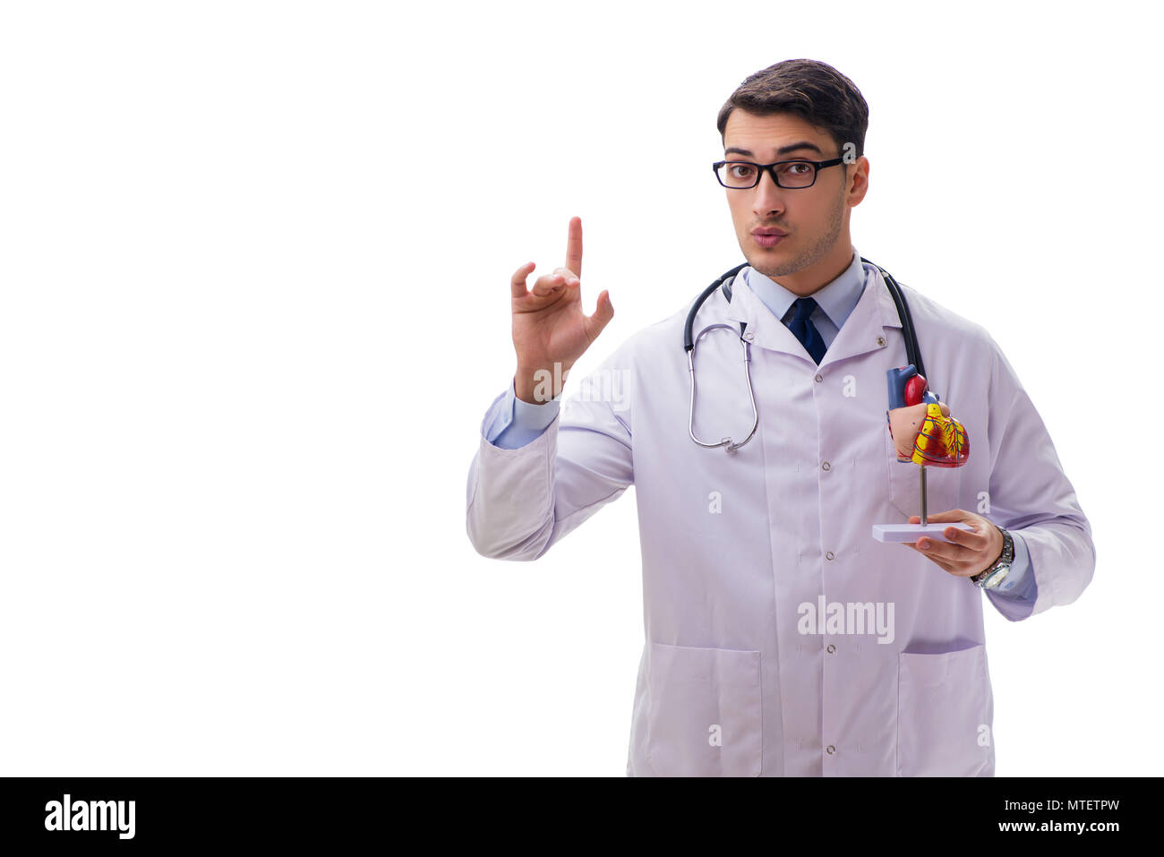 Young doctor with heart shape isolated on white Stock Photo - Alamy