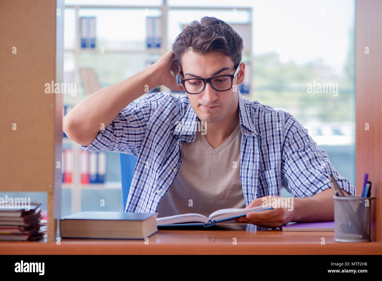 Student studying at home preparing for exam Stock Photo - Alamy