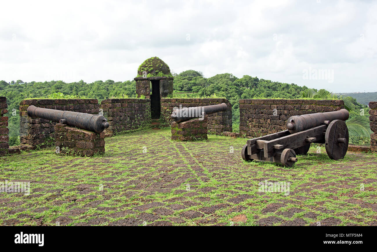 Historic and antique canons of the Portuguese era during their occupation of Goa, India, used for defense against attackers and intruders Stock Photo
